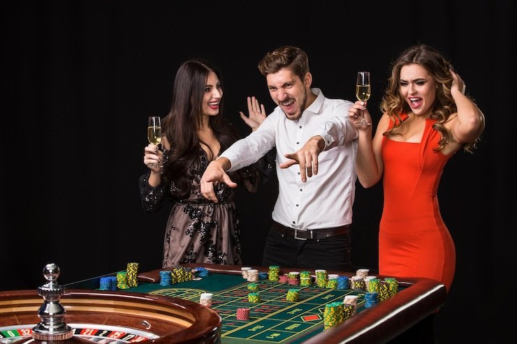 Meja Baccarat live dengan dealer profesional di studio multi-kamera raja colok